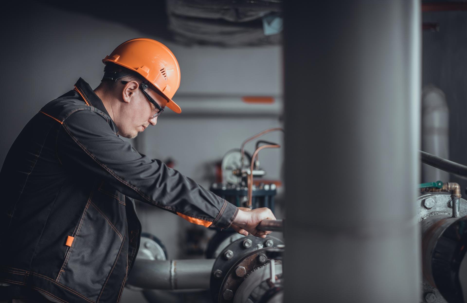 yadon technician working on projects in the boiler room